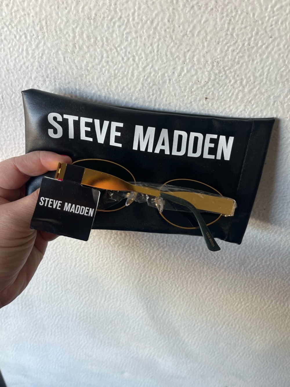 Steve Madden Oval Gold Frame Sunglasses with Dark Lenses